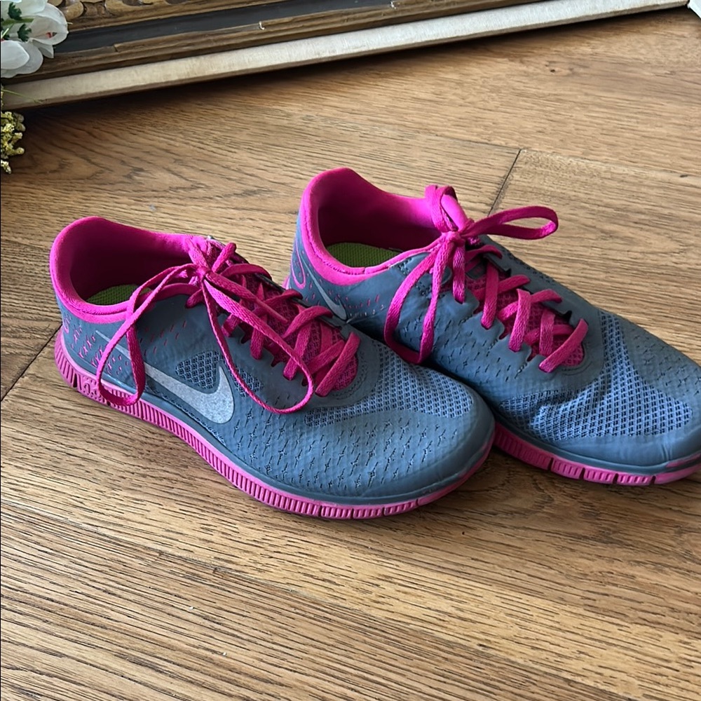 Nike Gray and Pink Athletic Shoes with Vibrant Accents